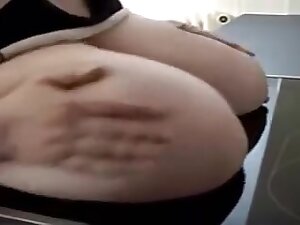 Mature with huge tits lets a younger boy have fun