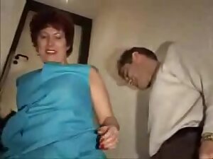 Busty granny fucks boy with her mouth and jugs