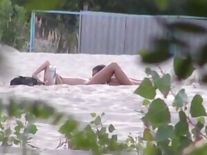 tapes 2 nudist couples having sex at the beach