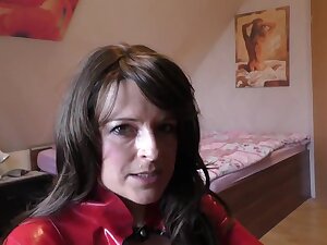 Brunette Milf in latex getting ready to cum