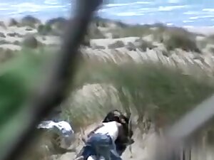 Filmed this pair fucking on the beach