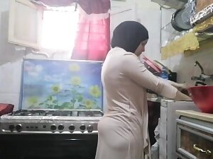 routine hijab arabic muslim in kitchen