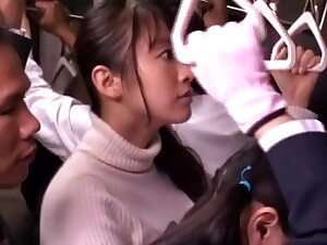 Japanese slut gets crammed in a crowded public bus