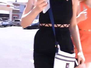 Girls defiles on the street showing off their asses