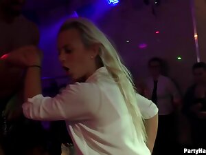 Ravishing college girls are having group sex in the night club with various handsome guys