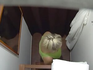 Busty mature blonde in a massage parlor