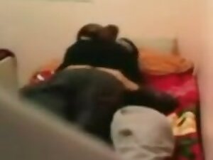 Arab couple in bed 4phone