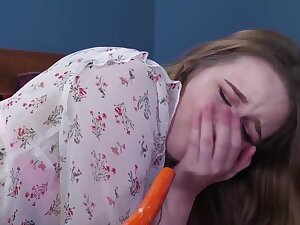 Babe gets carrot in ass