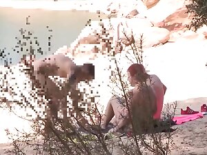 Couple Threesome In A Nudist Beach