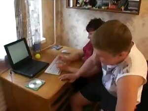 Russian boys teaching Step mom how to use the computer.