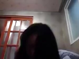Chinese girl playing with her pussy