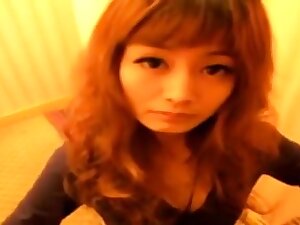 Happy chinese girl enjoy sucking
